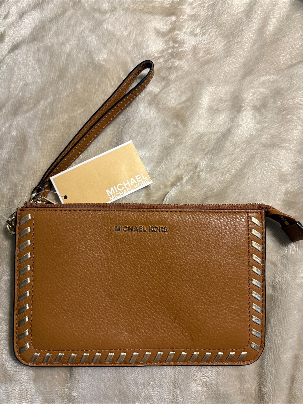 Michael Kors Tan Leather Wristlet with Silver Trim. NWT